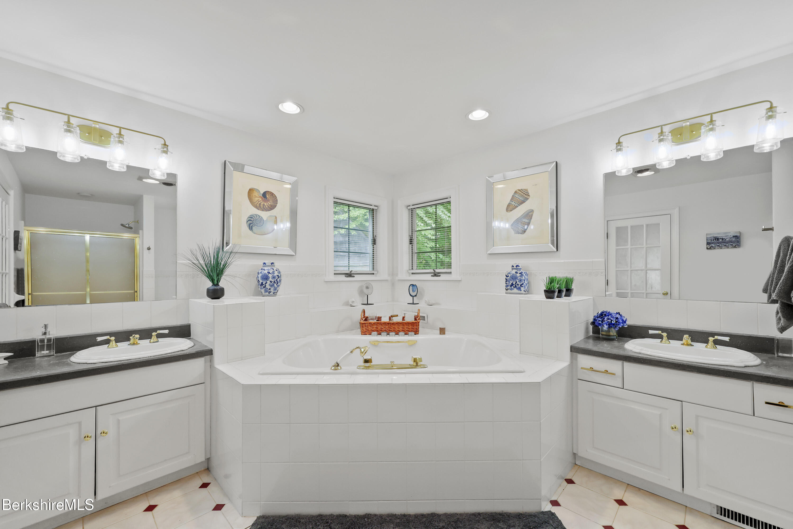 905 W Road Sheffield, MA 01230 - Photo 29 of 60 a white bath tub sitting in a bathroom next to a window