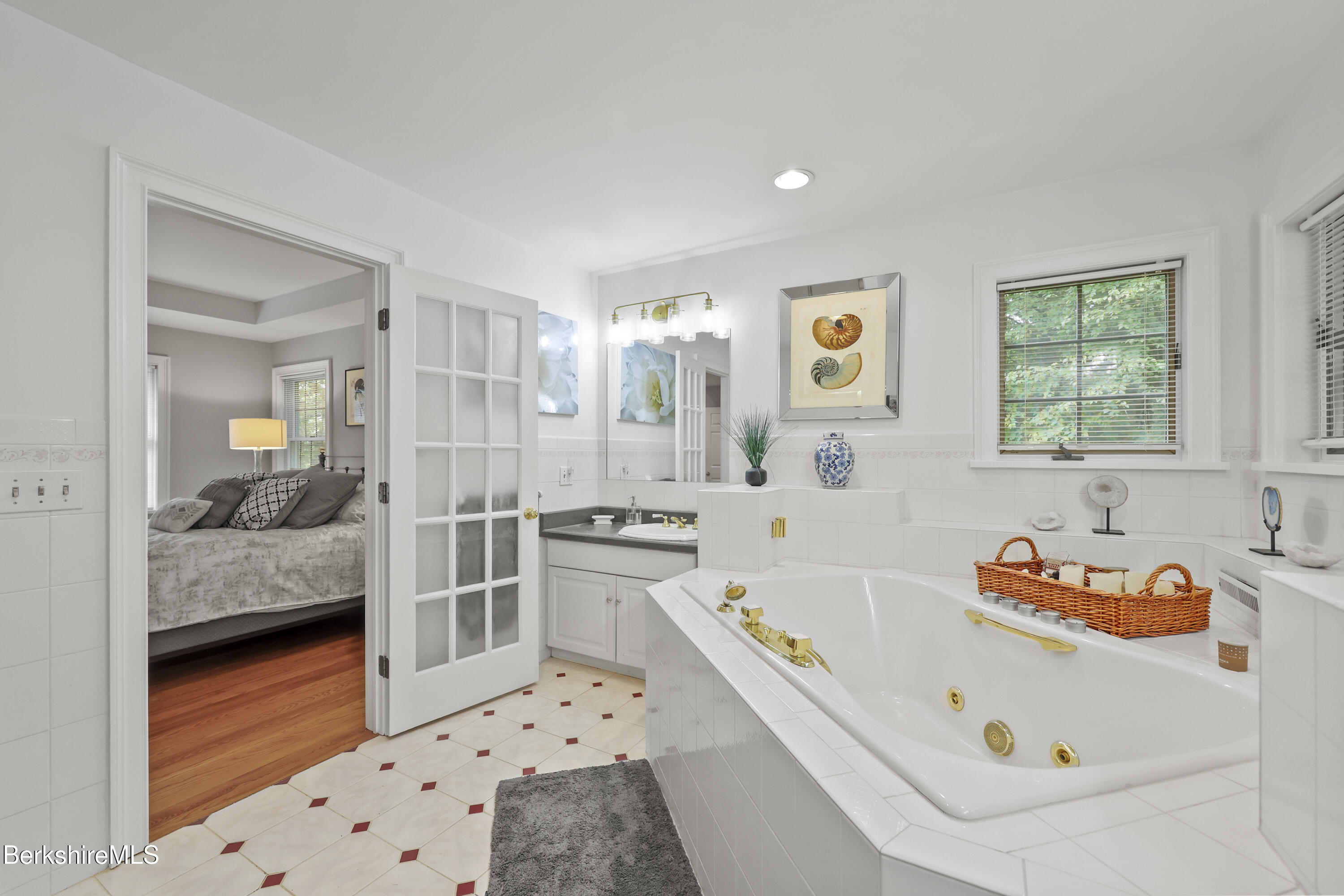 905 W Road Sheffield, MA 01230 - Photo 30 of 60 a bathroom with a bathtub and a sink