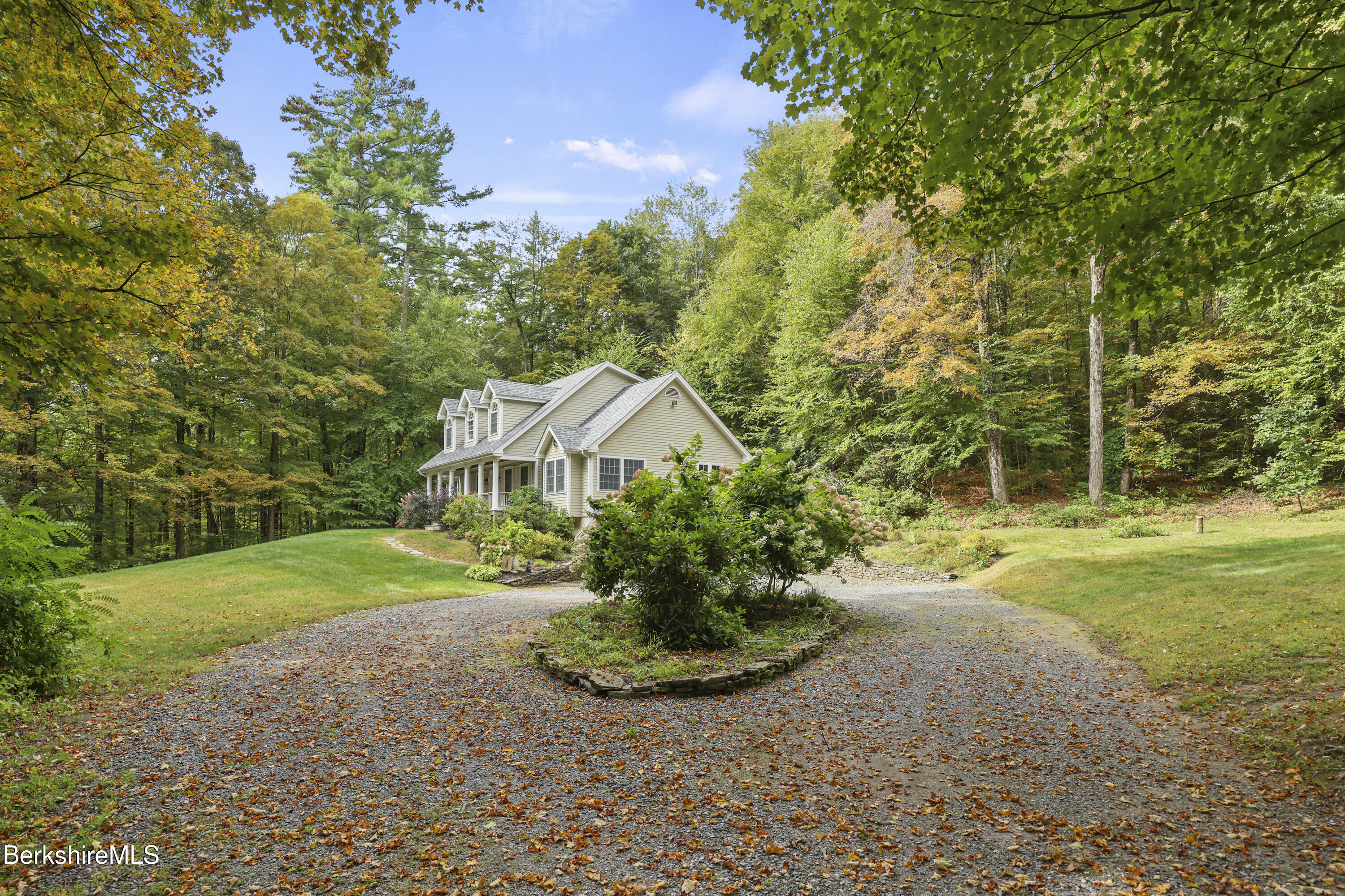 905 W Road Sheffield, MA 01230 - Photo 3 of 60 a view of a garden with a house