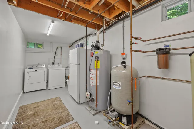 a view of balcony with wooden floor and fence