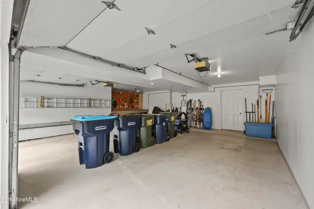 a view of a swimming pool with a yard