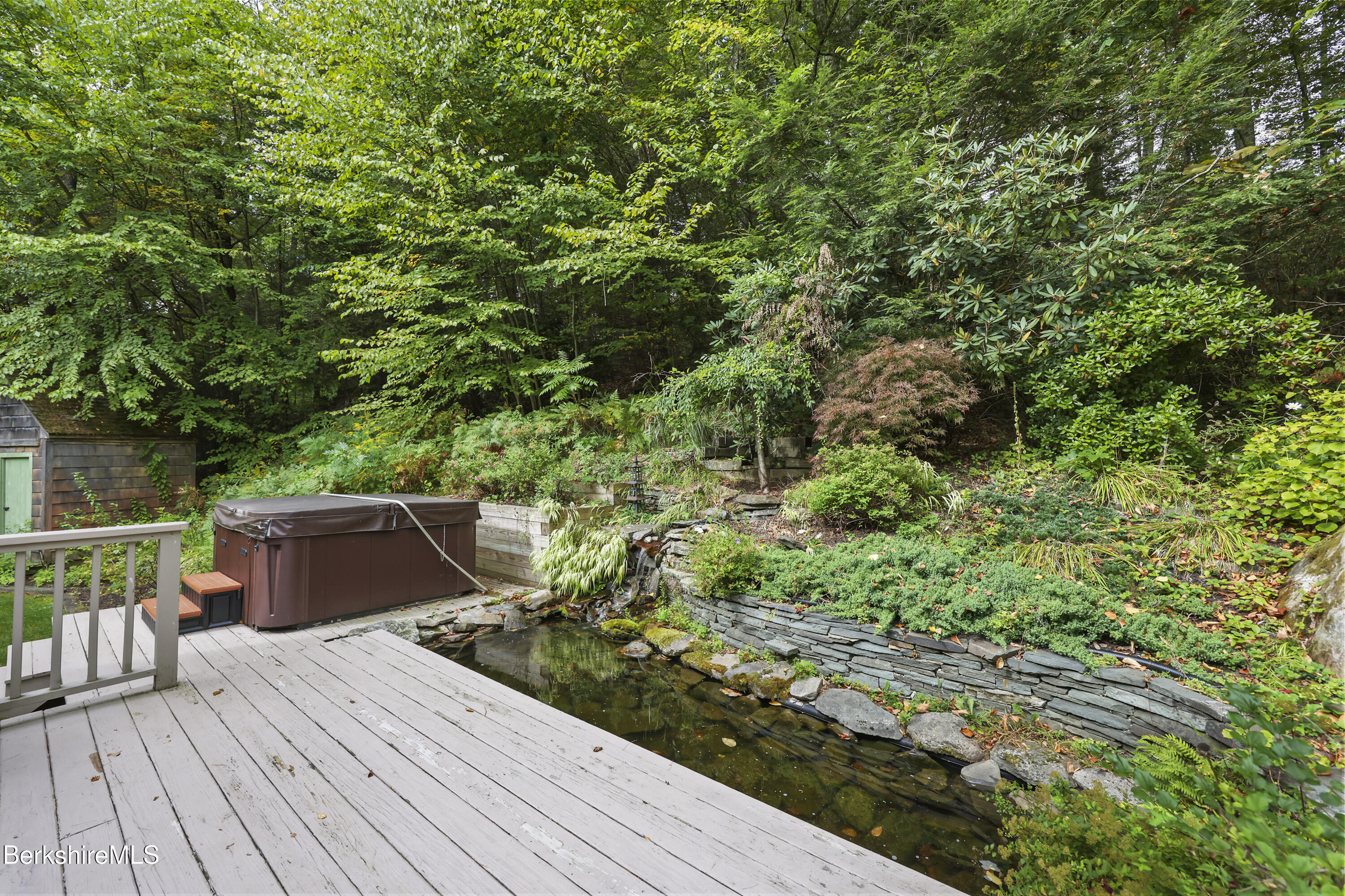 905 W Road Sheffield, MA 01230 - Photo 49 of 60 a view of balcony with wooden floor and fence