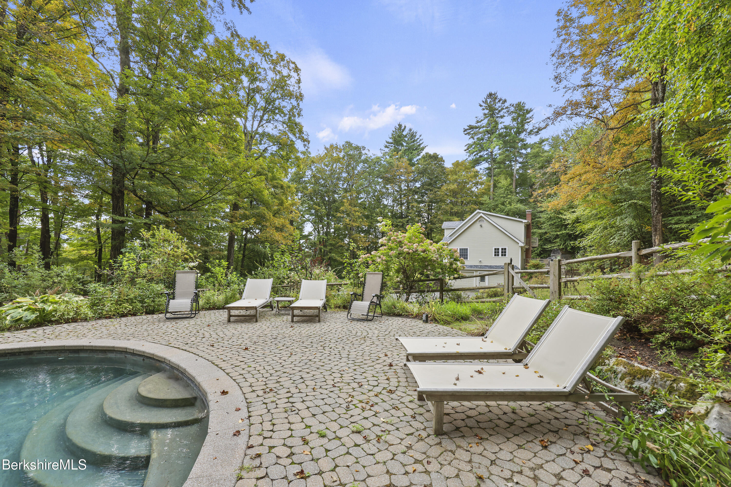 905 W Road Sheffield, MA 01230 - Photo 53 of 60 a view of a chair and tables in the patio