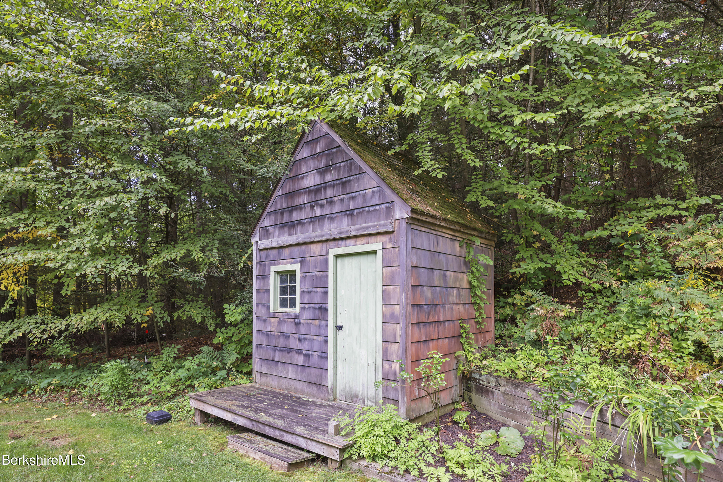 905 W Road Sheffield, MA 01230 - Photo 54 of 60 a view of a backyard with plants