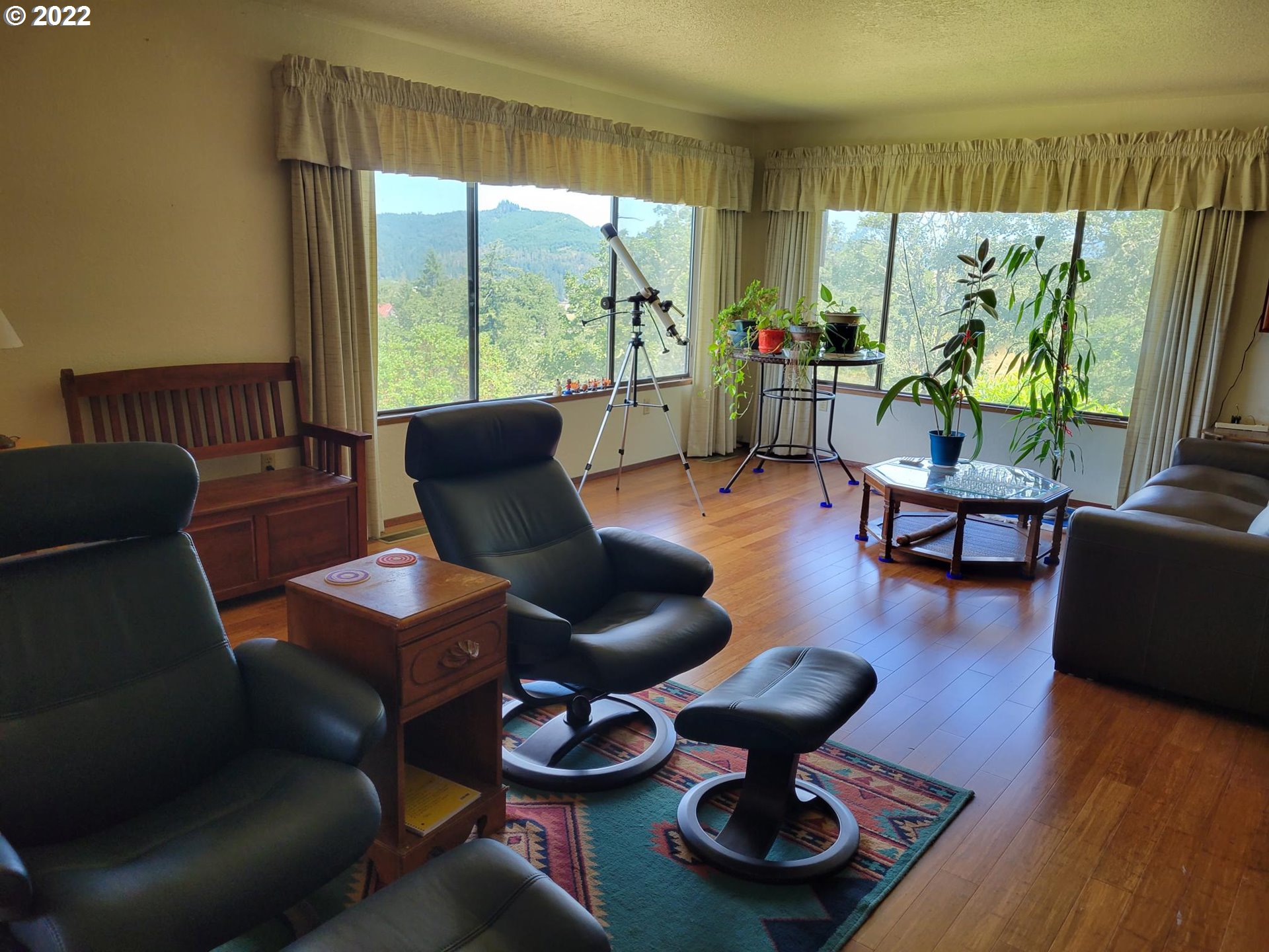 752 Cooper Creek Road Sutherlin, OR 97479 - Photo 6 of 10 a living room with furniture and a large window