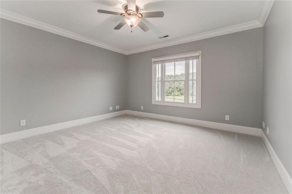 311 Langston Road Southeast Calhoun, GA 30701 - Photo 13 of 100 an empty room with a window