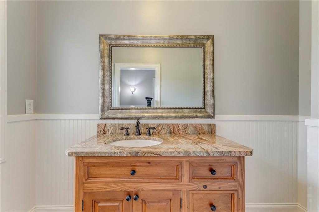 311 Langston Road Southeast Calhoun, GA 30701 - Photo 34 of 100 a bathroom with a sink and a mirror