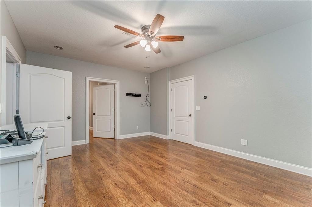311 Langston Road Southeast Calhoun, GA 30701 - Photo 43 of 100 wooden floor in an empty room with a window