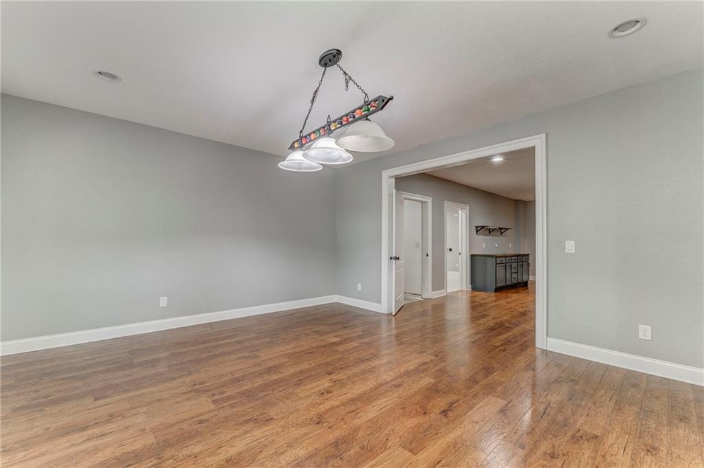 311 Langston Road Southeast Calhoun, GA 30701 - Photo 46 of 100 a view of a room with wooden floor and white walls