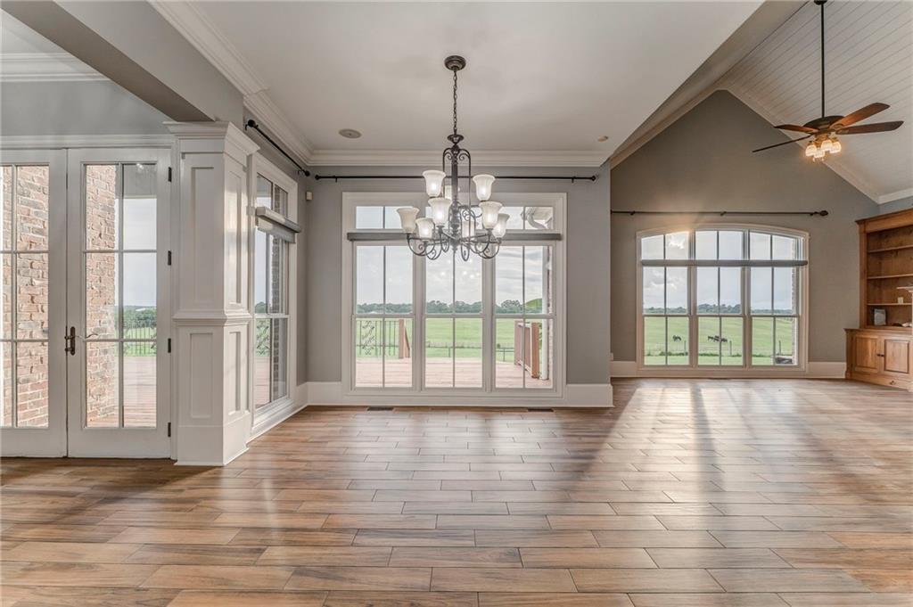 311 Langston Road Southeast Calhoun, GA 30701 - Photo 67 of 100 a view of an empty room with wooden floor and a window