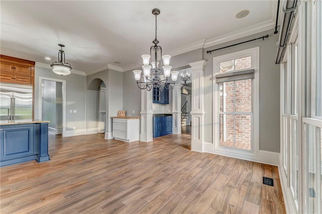 311 Langston Road Southeast Calhoun, GA 30701 - Photo 70 of 100 a view of a room with wooden floor chandelier and windows