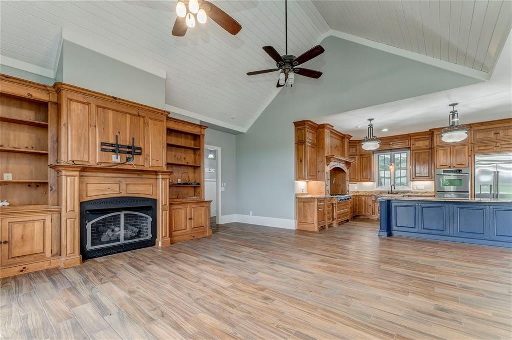 311 Langston Road Southeast Calhoun, GA 30701 - Photo 73 of 100 a living room with furniture and a fireplace