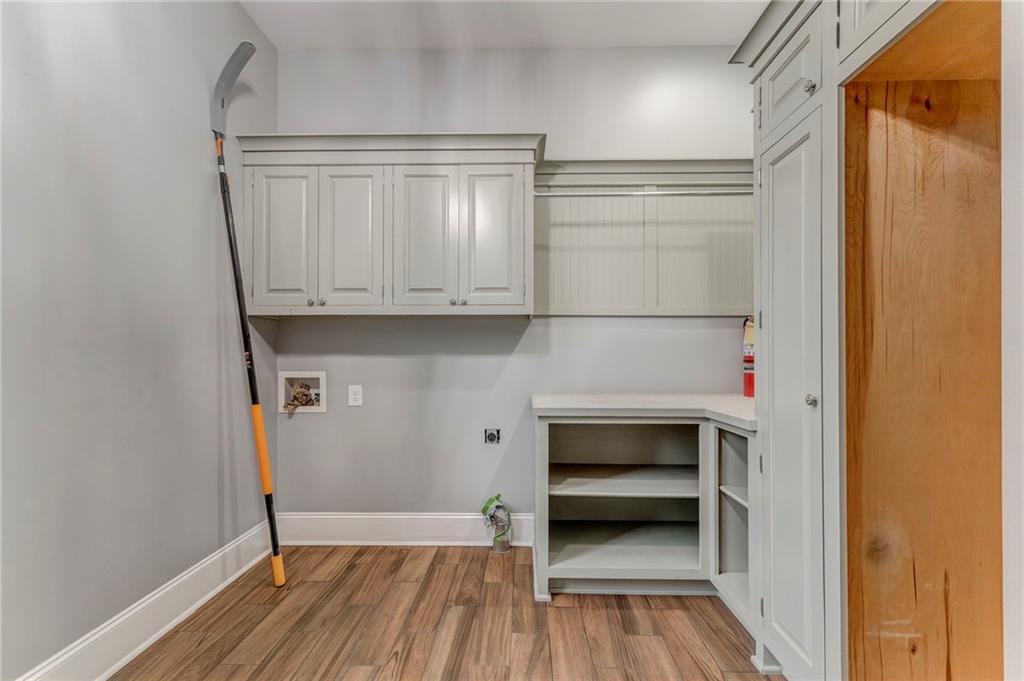 311 Langston Road Southeast Calhoun, GA 30701 - Photo 98 of 100 a view of storage and utility room with wooden floor
