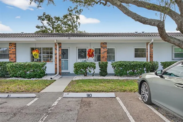 a view of a house with a garden