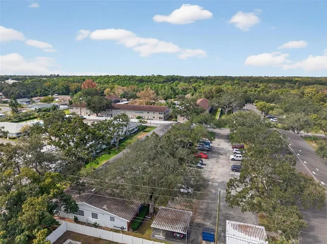 a view of a balcony with floor to ceiling windows