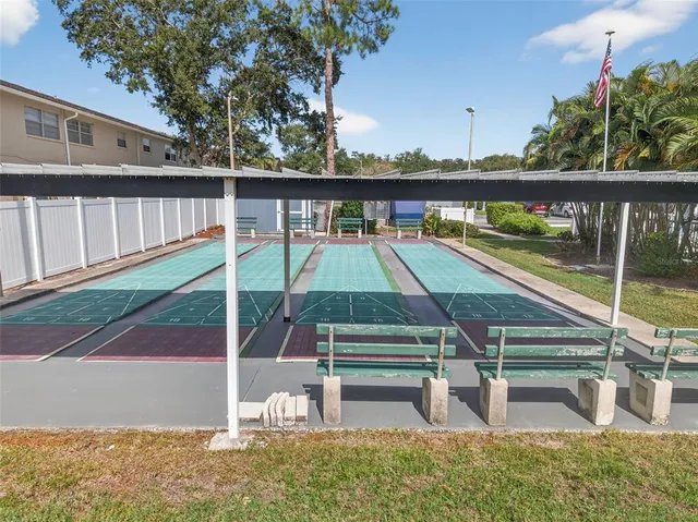 a view of house with backyard space and garden