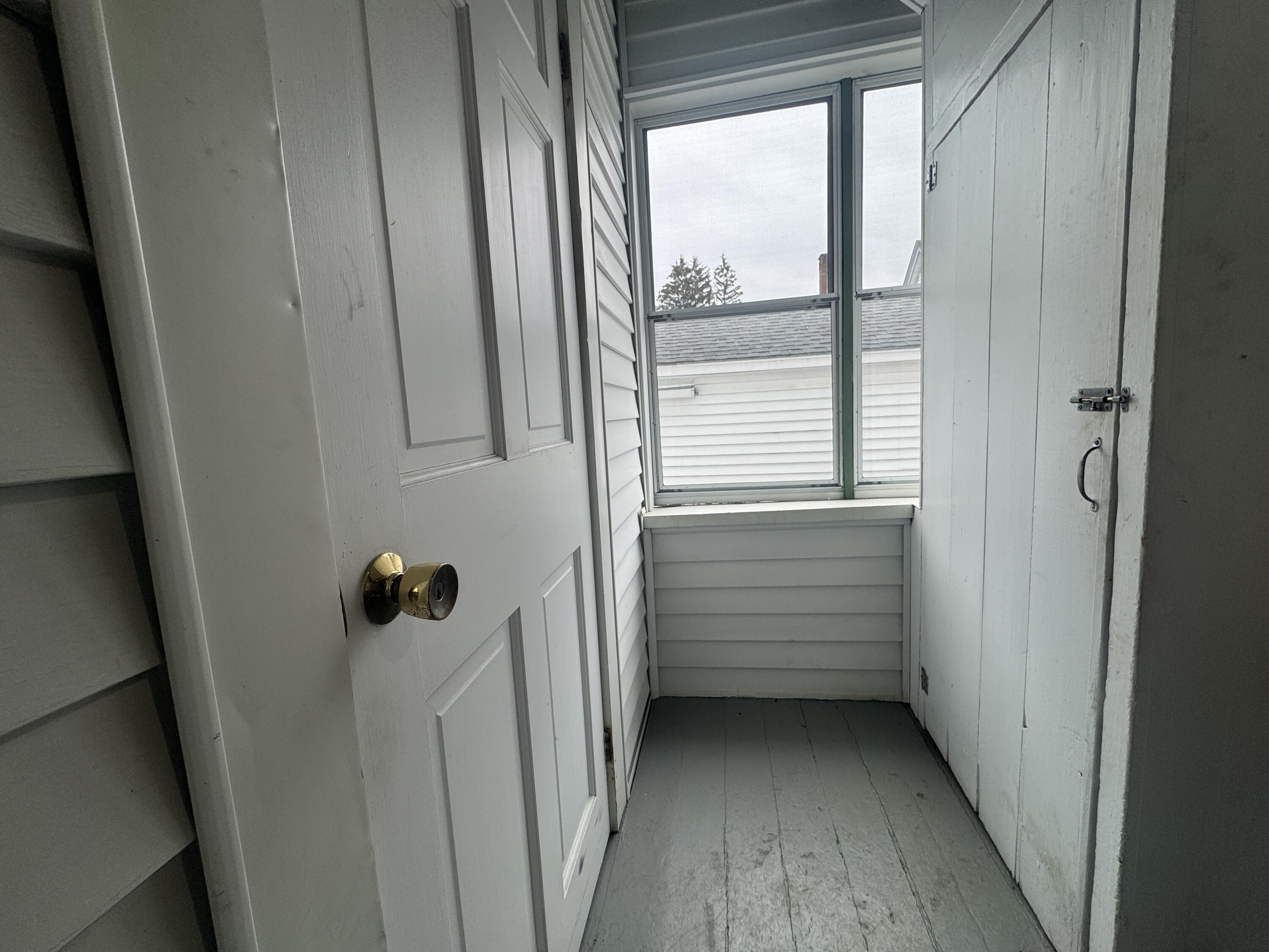 33 Franklin Street Augusta, ME 04330 - Photo 27 of 34 27) Porch area to Laundry and Basement