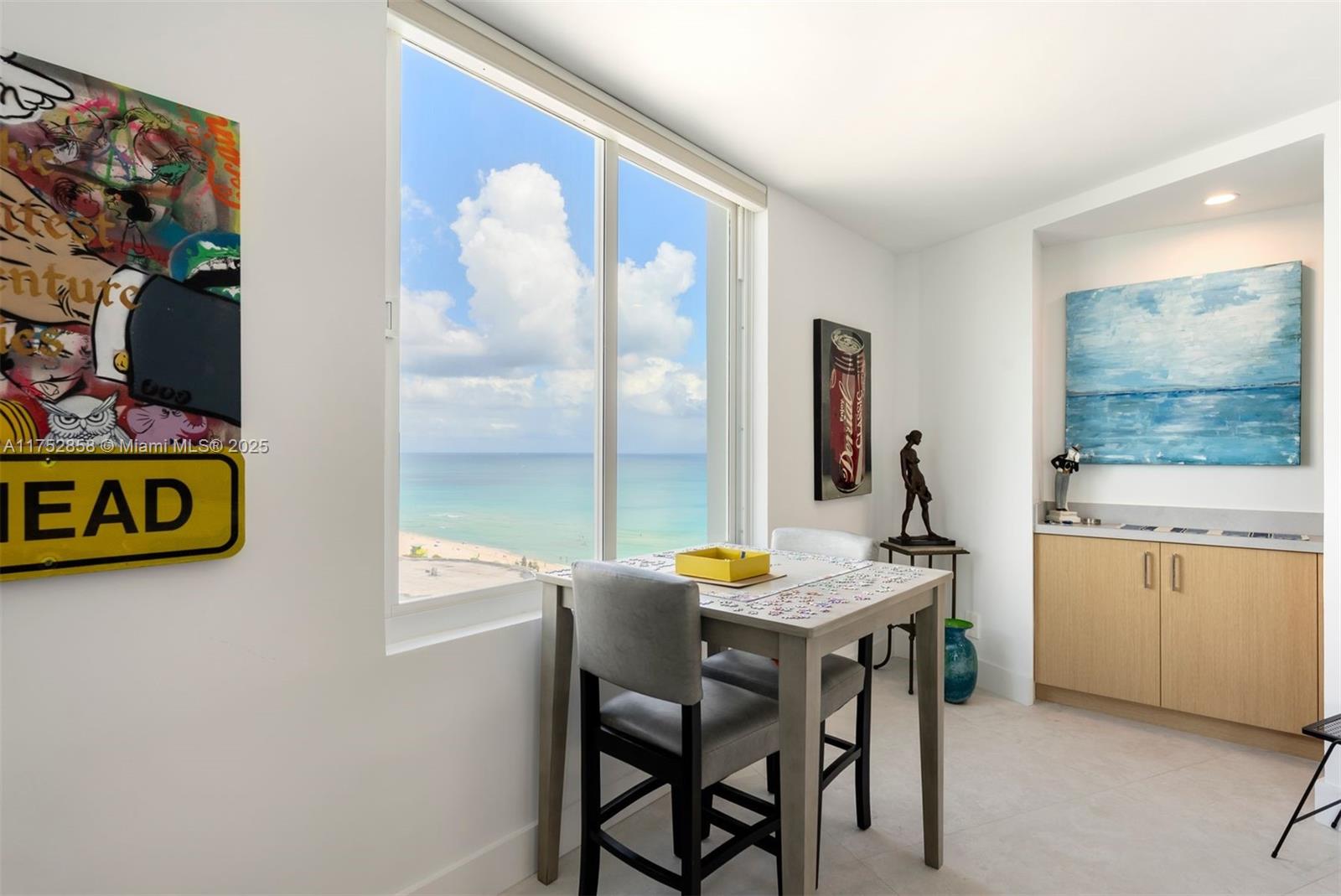 5401 Collins Avenue, Unit 1220 Miami Beach, FL 33140 - Photo 5 of 13 a room with furniture and window