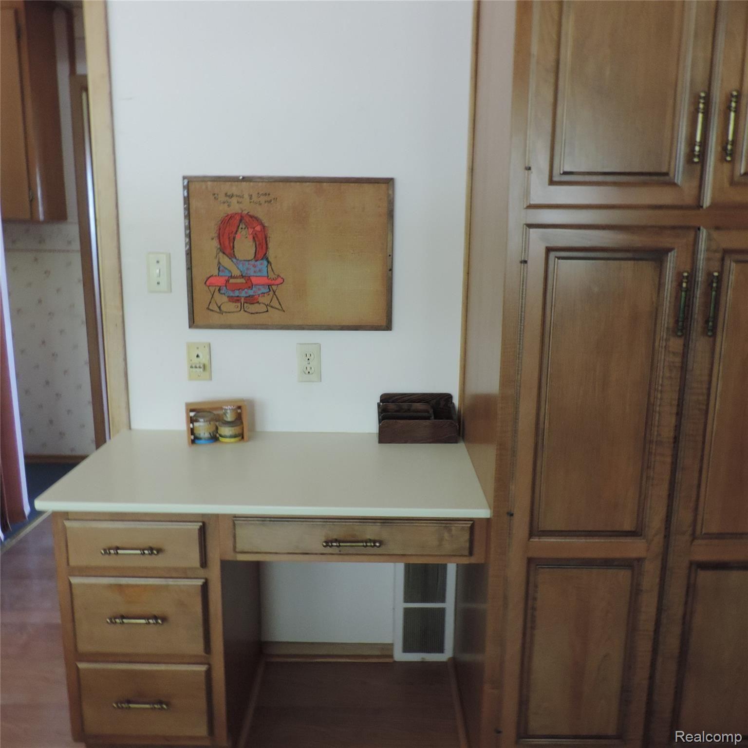 1650 West Predmore Road Oakland, MI 48363 - Photo 9 of 19 kitchen desk.