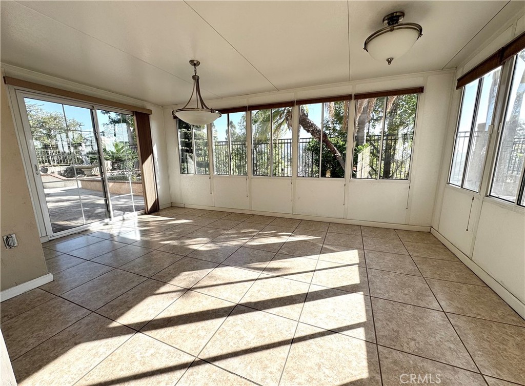 16208 Peppertree Lane La Mirada, CA 90638 - Photo 22 of 75 a view of an empty room with a window