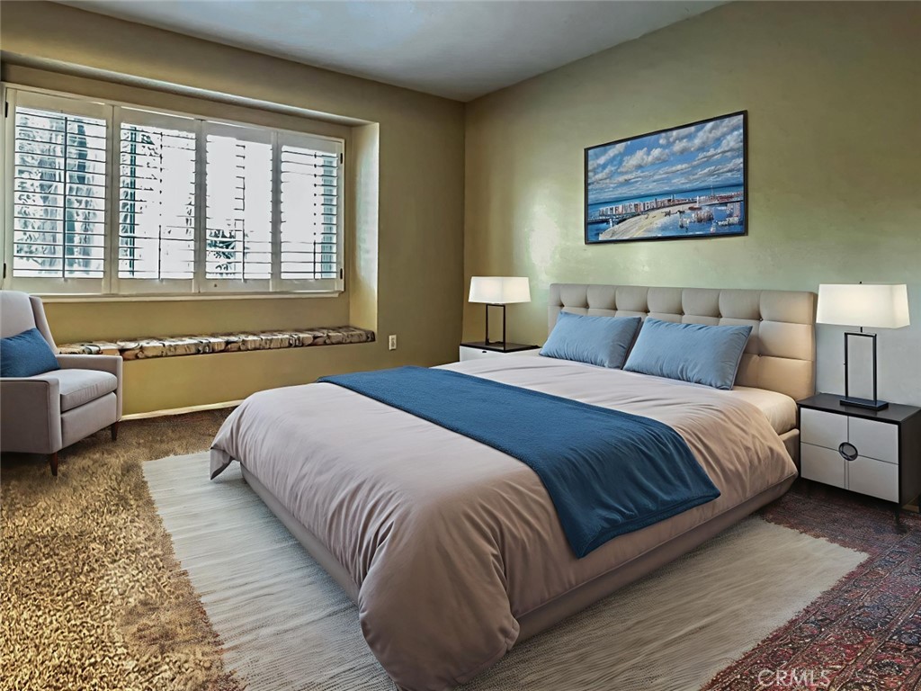 16208 Peppertree Lane La Mirada, CA 90638 - Photo 6 of 75 a bedroom with a bed and a large window