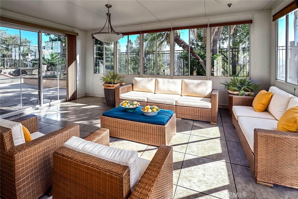 16208 Peppertree Lane La Mirada, CA 90638 - Photo 10 of 75 a living room with furniture and a large window