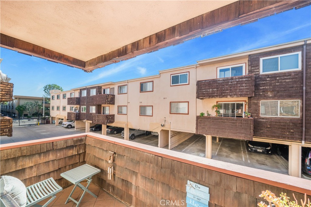 5403 Newcastle Avenue, Unit 12 Encino, CA 91316 - Photo 22 of 26 a view of a building with a balcony