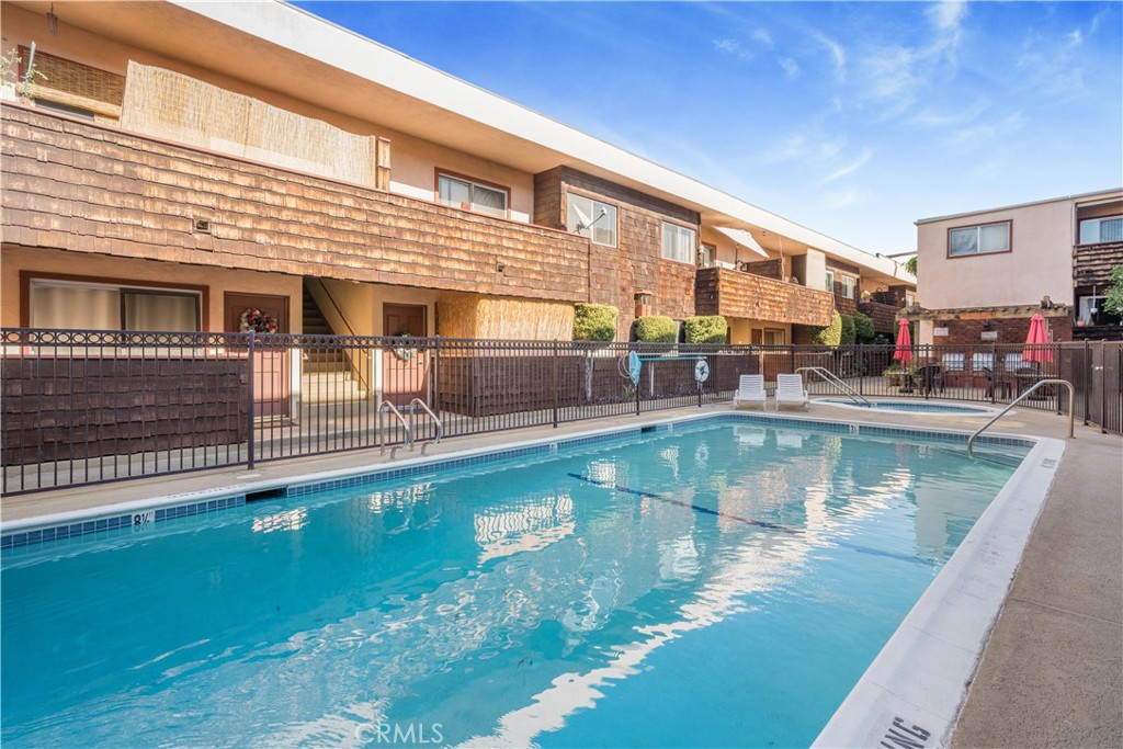 5403 Newcastle Avenue, Unit 12 Encino, CA 91316 - Photo 23 of 26 a view of a swimming pool with a patio