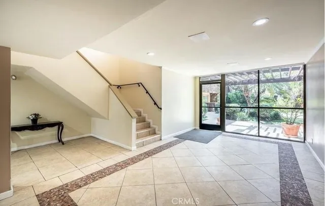 a view of an empty room and windows