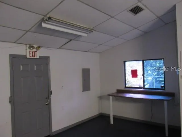 a room with furniture and window