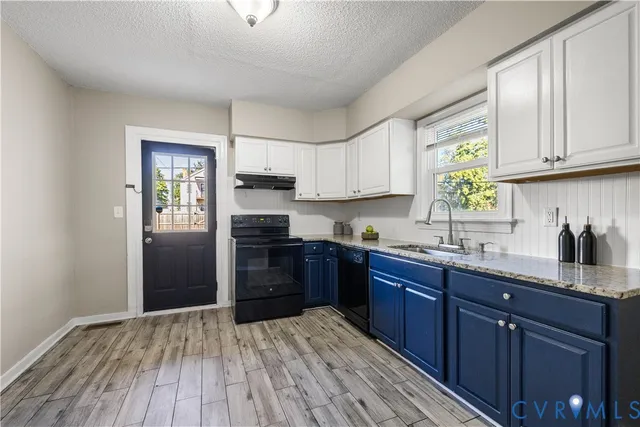 a bathroom with a toilet a sink and a mirror