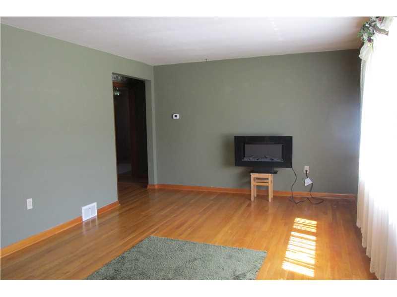 4435 Evergreen Road Summer Hill, PA 15214 - Photo 3 of 22 Living Room. large room, beautiful hardwood floors, which are throughout the first floor