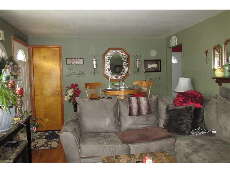 4435 Evergreen Road Summer Hill, PA 15214 - Photo 4 of 22 Living Room. large living room. has closet for coats. great wall space for big screen tv and artwork.