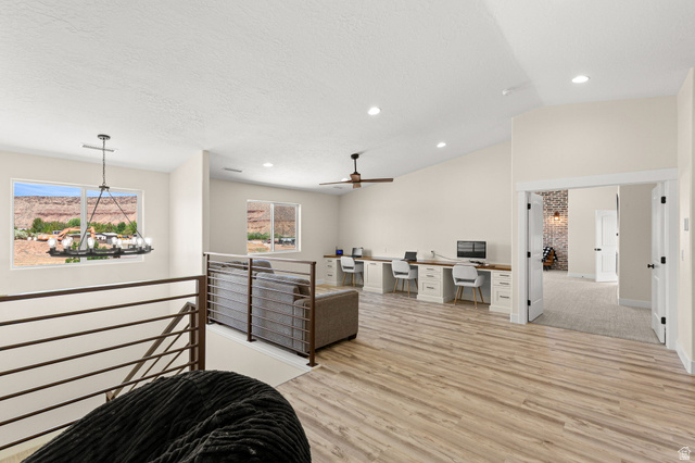 2591 East Washington Dam Road Washington, UT 84780 - Photo 18 of 67 Spacious loft area featuring wood-finish flooring, vaulted ceilings, and recessed lighting