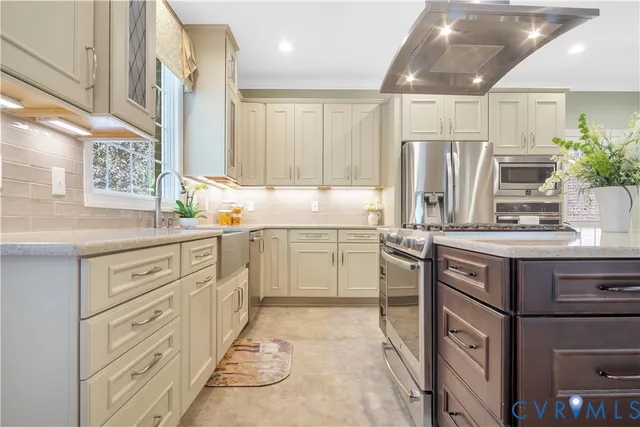 a kitchen with appliances cabinets and a sink