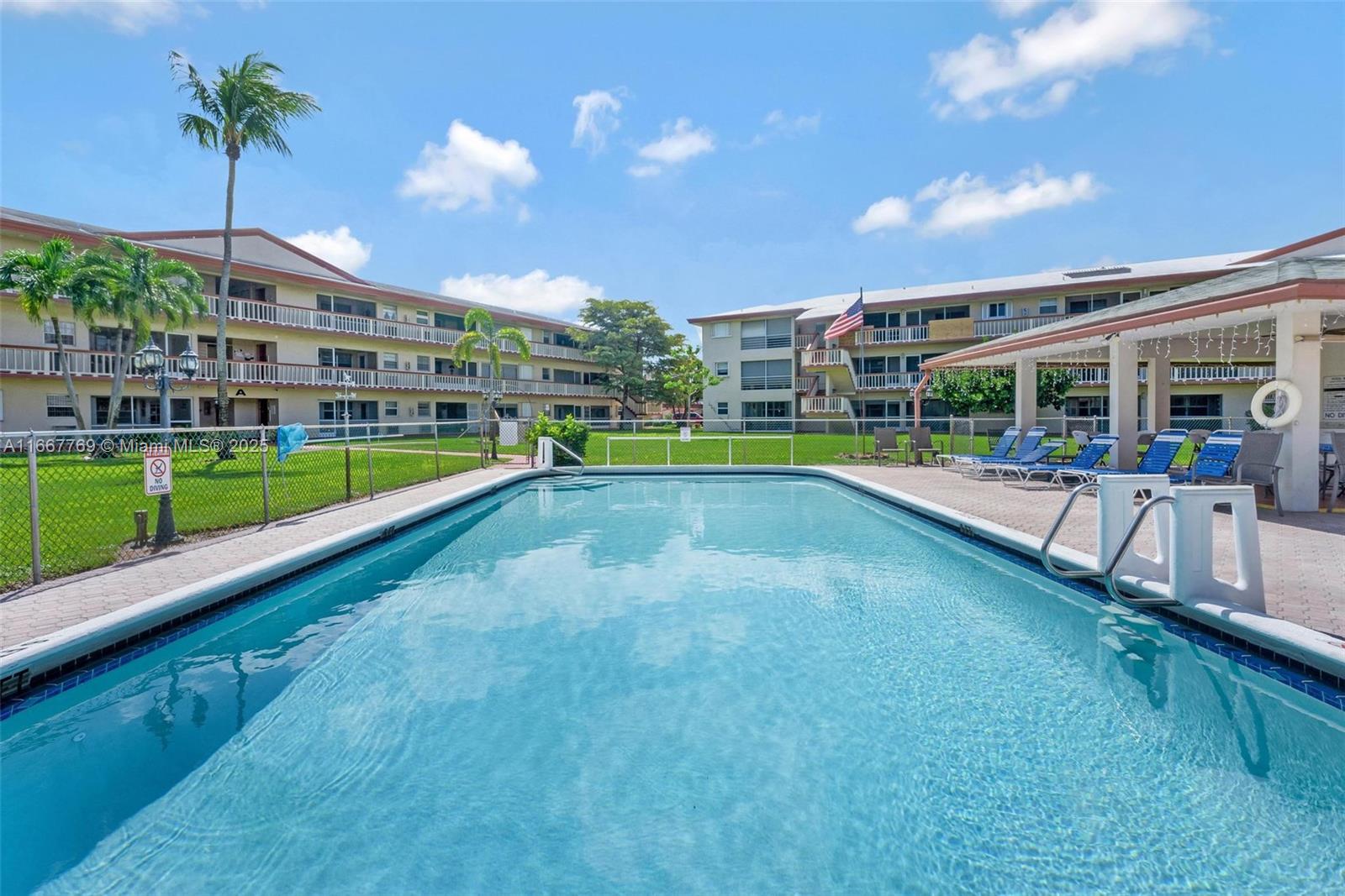 5300 Washington Street, Unit C111 Hollywood, FL 33021 - Photo 28 of 40 a view of an ocean with a swimming pool