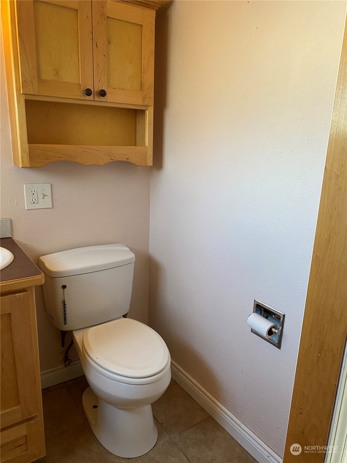 4008 North Marguerite Road Spokane, WA 99212 - Photo 11 of 40 a white toilet sitting next to a sink