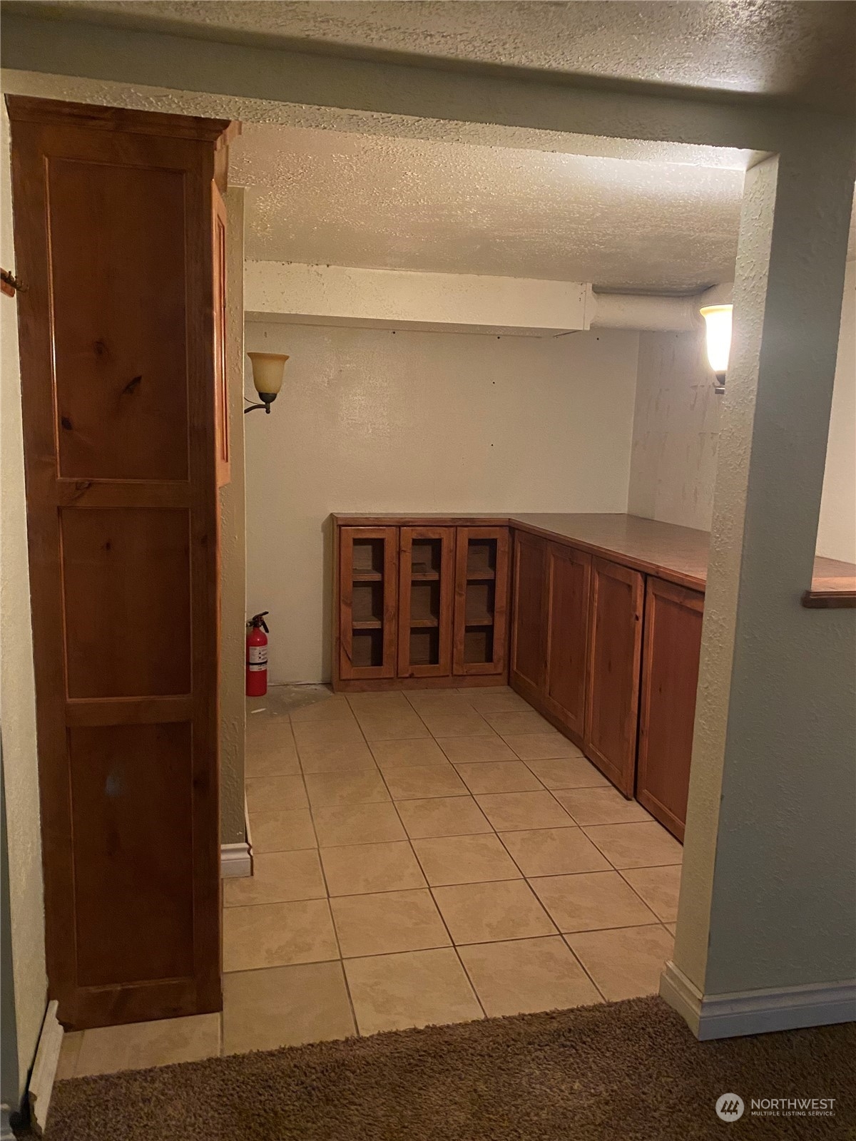 4008 North Marguerite Road Spokane, WA 99212 - Photo 21 of 40 a view of an empty room with wooden floor