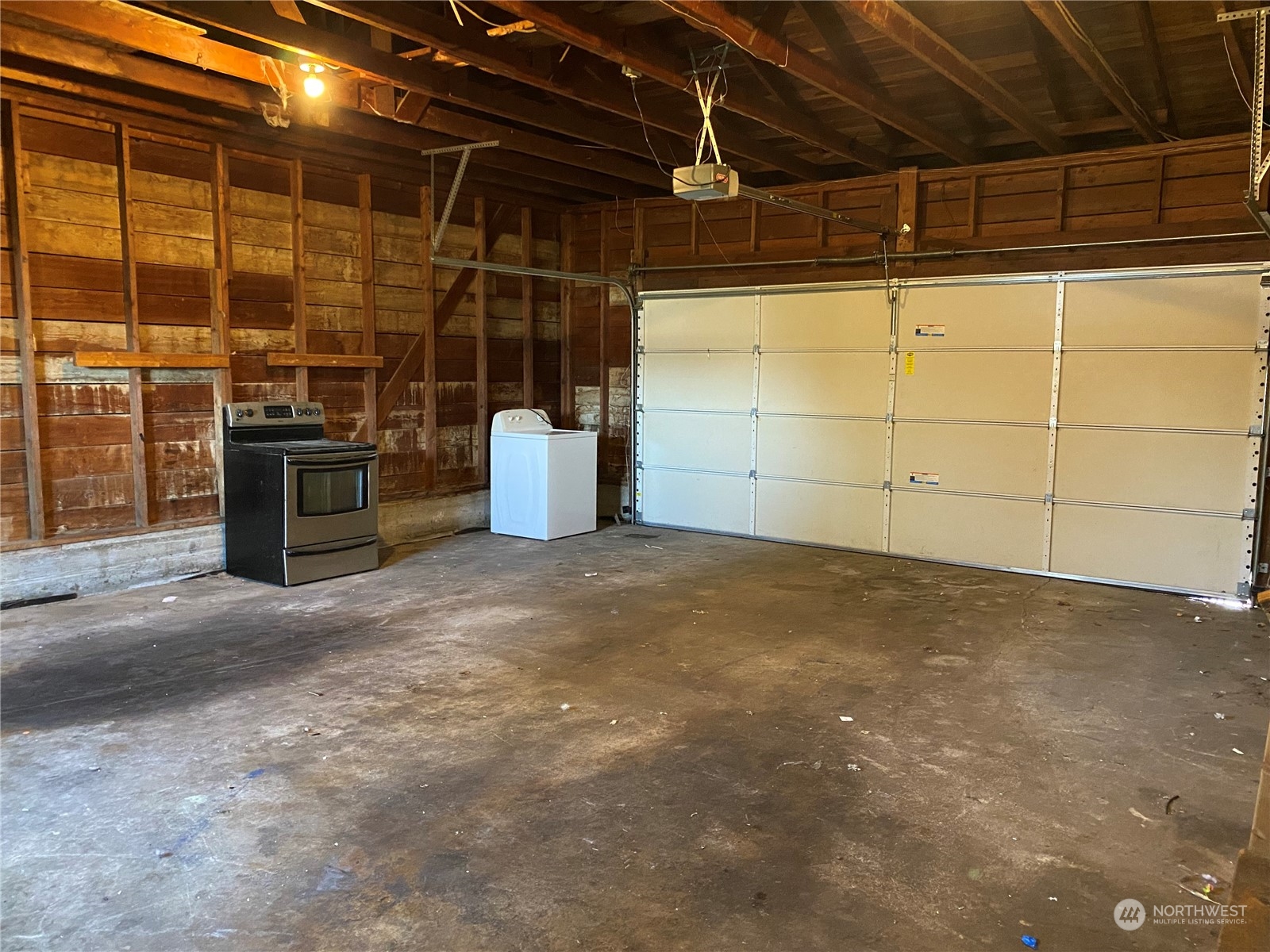 4008 North Marguerite Road Spokane, WA 99212 - Photo 31 of 40 a view of a room with wooden walls