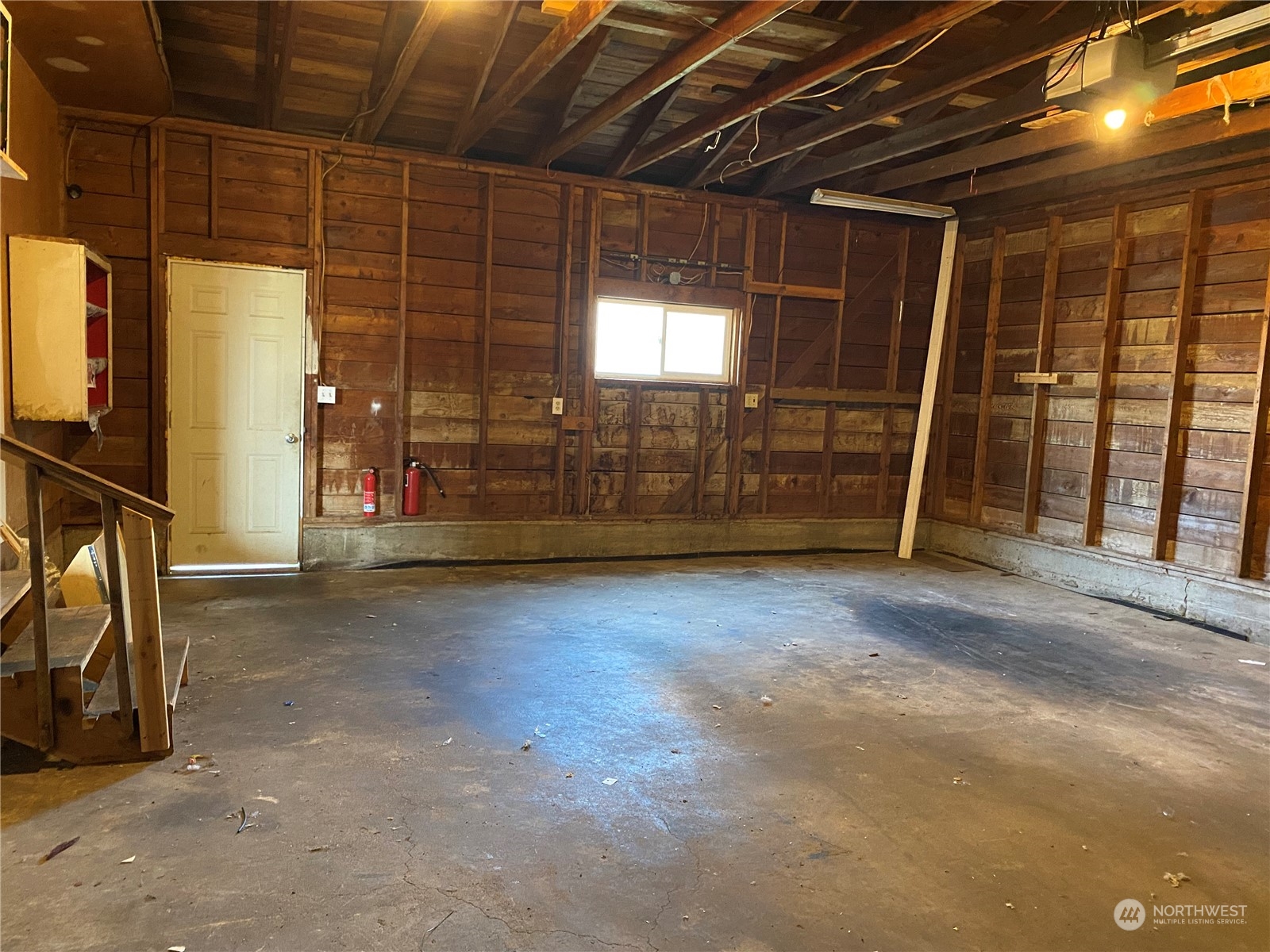 4008 North Marguerite Road Spokane, WA 99212 - Photo 33 of 40 a view of empty room with wooden walls