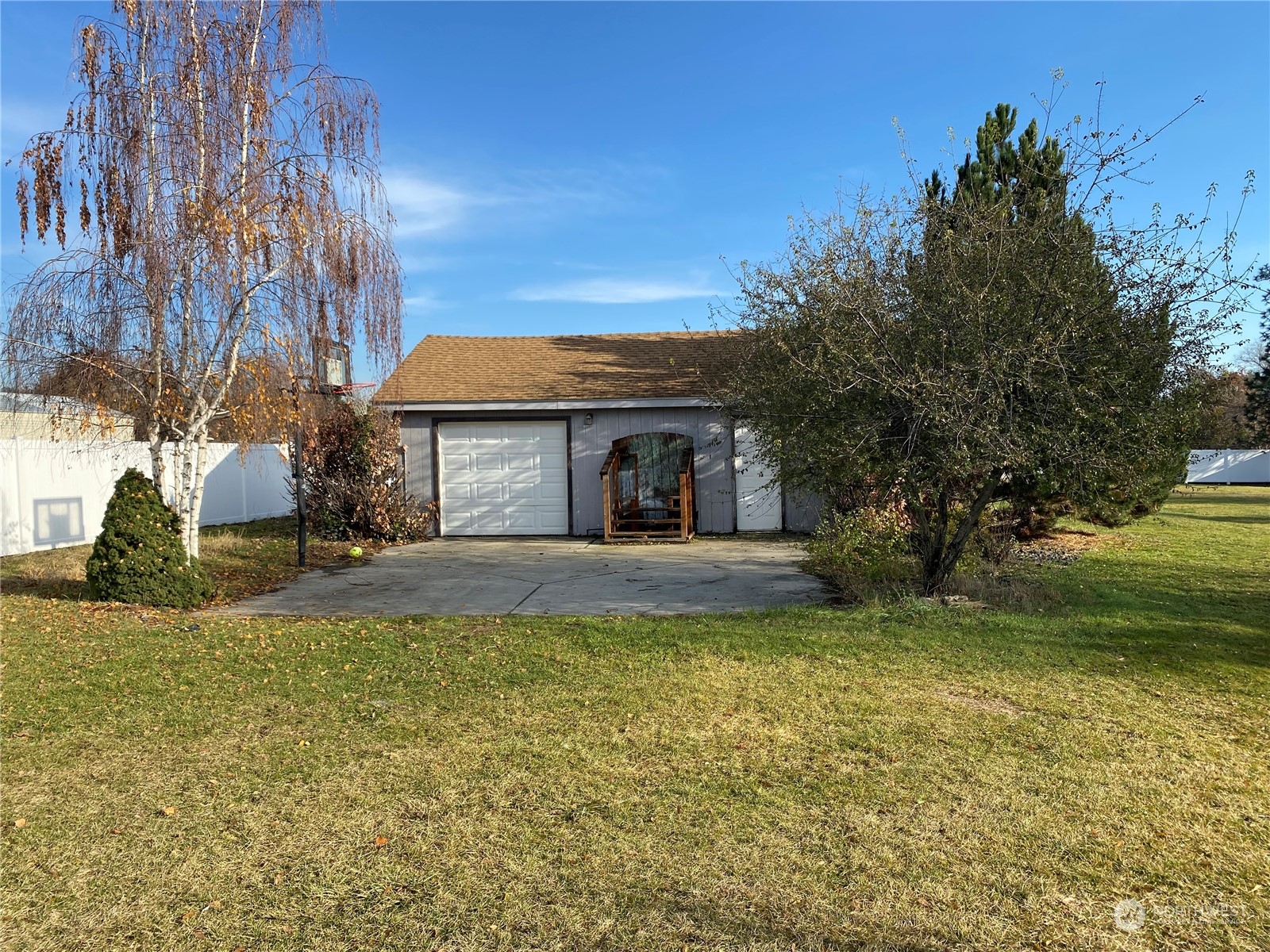 4008 North Marguerite Road Spokane, WA 99212 - Photo 36 of 40 a view of a house with pool and a yard