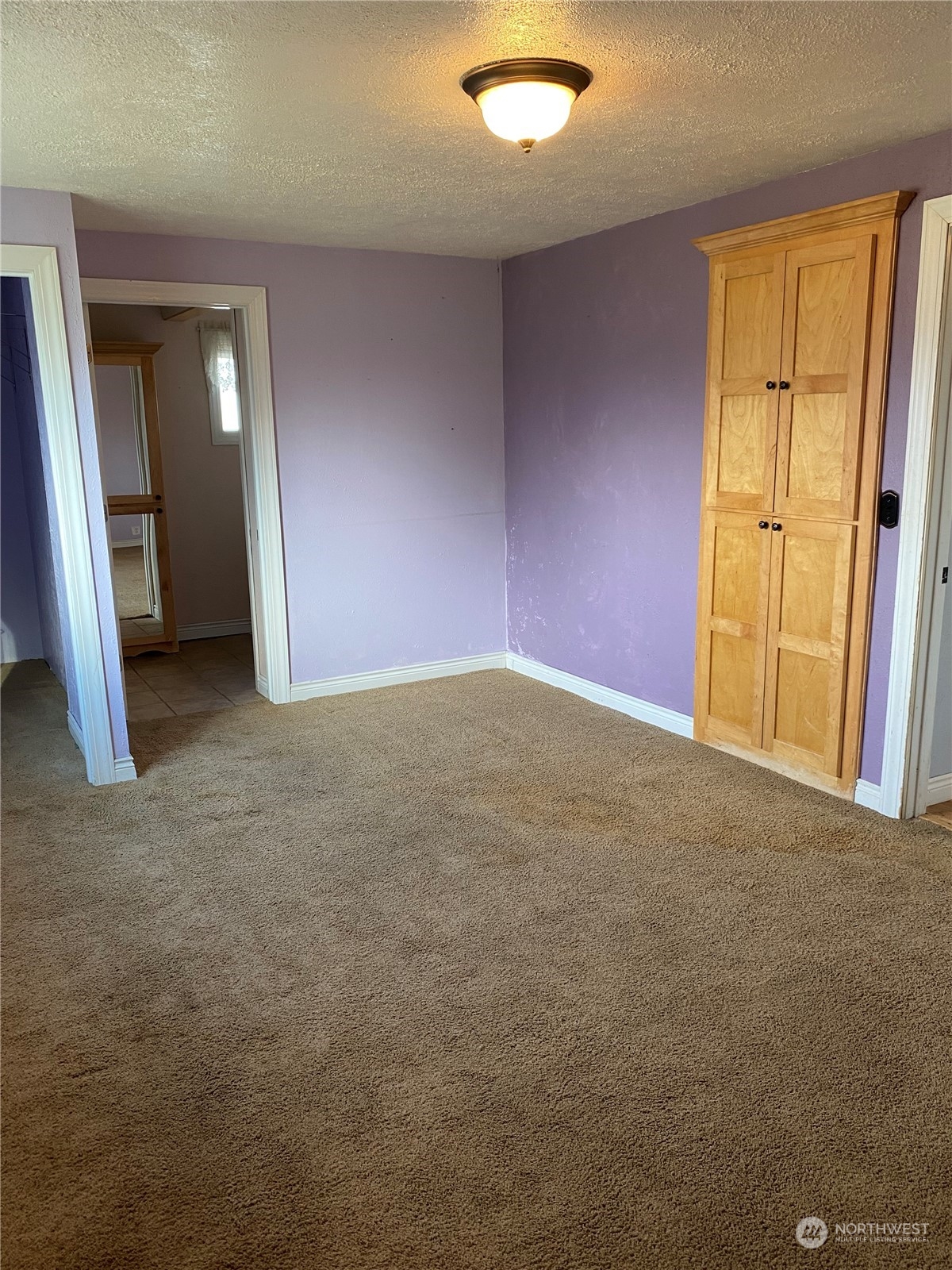 4008 North Marguerite Road Spokane, WA 99212 - Photo 8 of 40 an empty room with windows