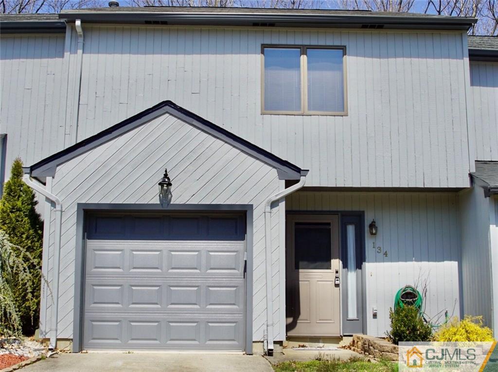 134 Redpine Loop Old Bridge, NJ 08857 - Photo 1 of 12 a front view of a house