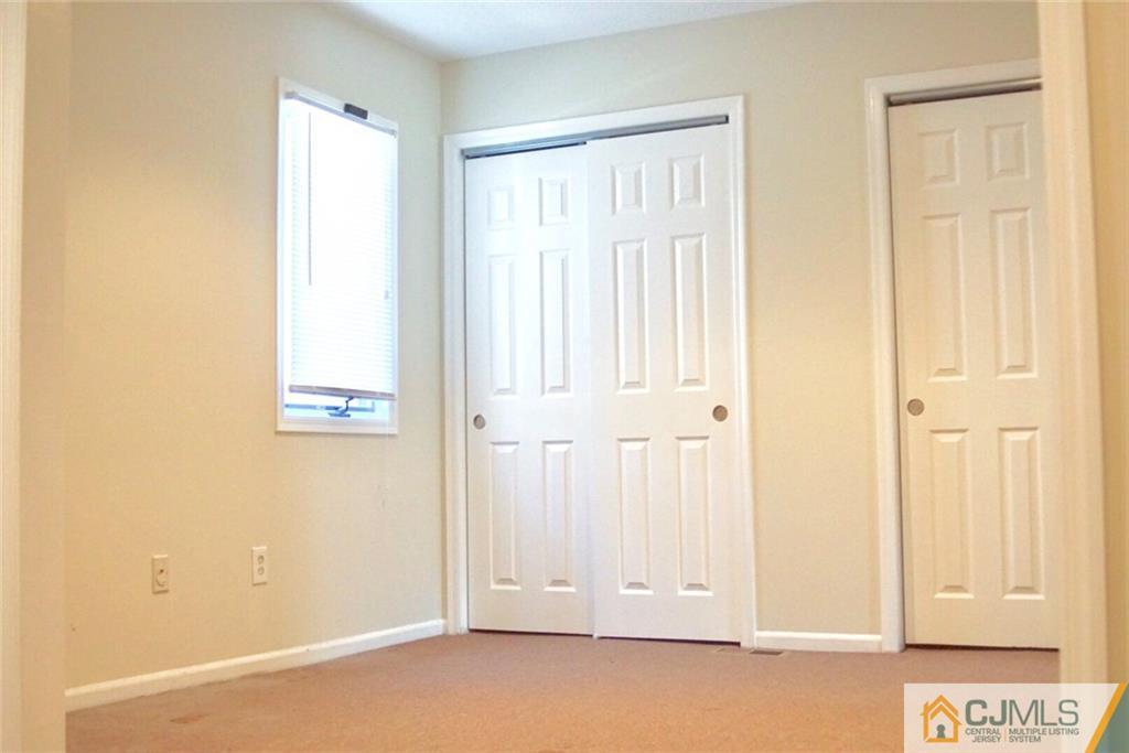 134 Redpine Loop Old Bridge, NJ 08857 - Photo 9 of 12 an empty room with window