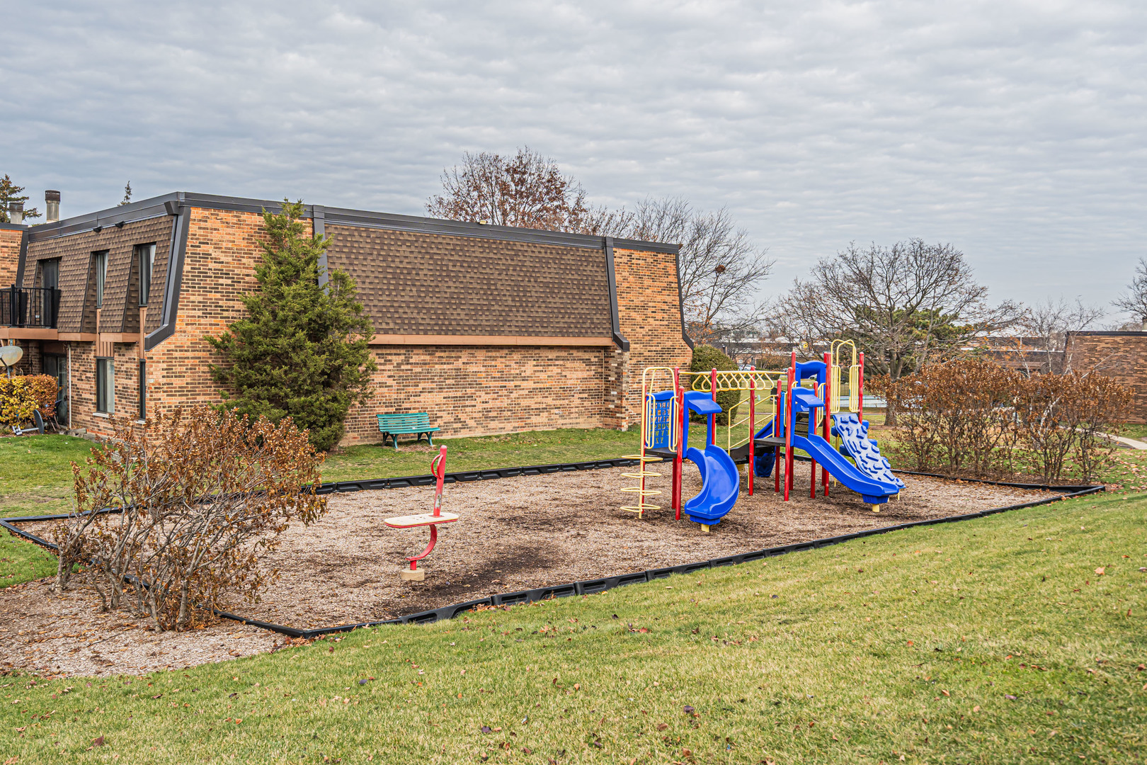 727 Killarney Court, Unit 2D Schaumburg, IL 60193 - Photo 16 of 21 a view of park with swings