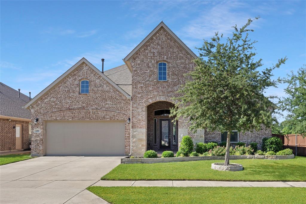 216 Equestrian Road Hickory Creek, TX 75065 - Photo 1 of 26 a front view of a house with a yard