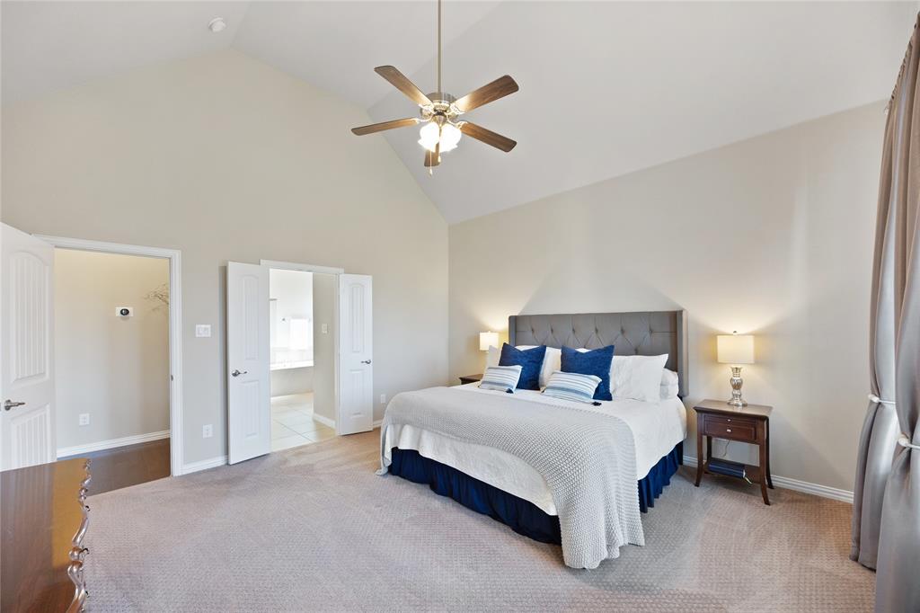 216 Equestrian Road Hickory Creek, TX 75065 - Photo 12 of 26 a bedroom with a bed and window