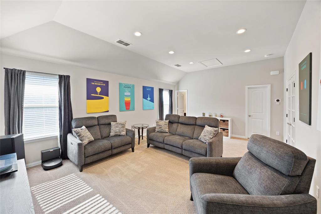 216 Equestrian Road Hickory Creek, TX 75065 - Photo 16 of 26 a living room with furniture and a couch