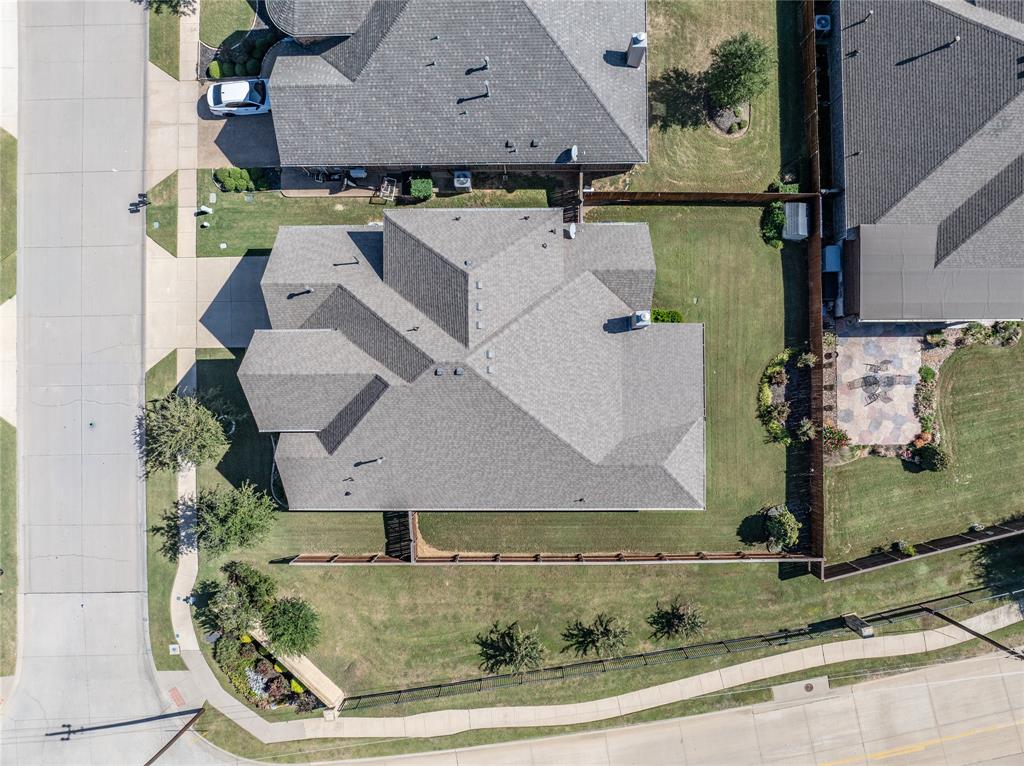 216 Equestrian Road Hickory Creek, TX 75065 - Photo 22 of 26 an aerial view of a house with a yard