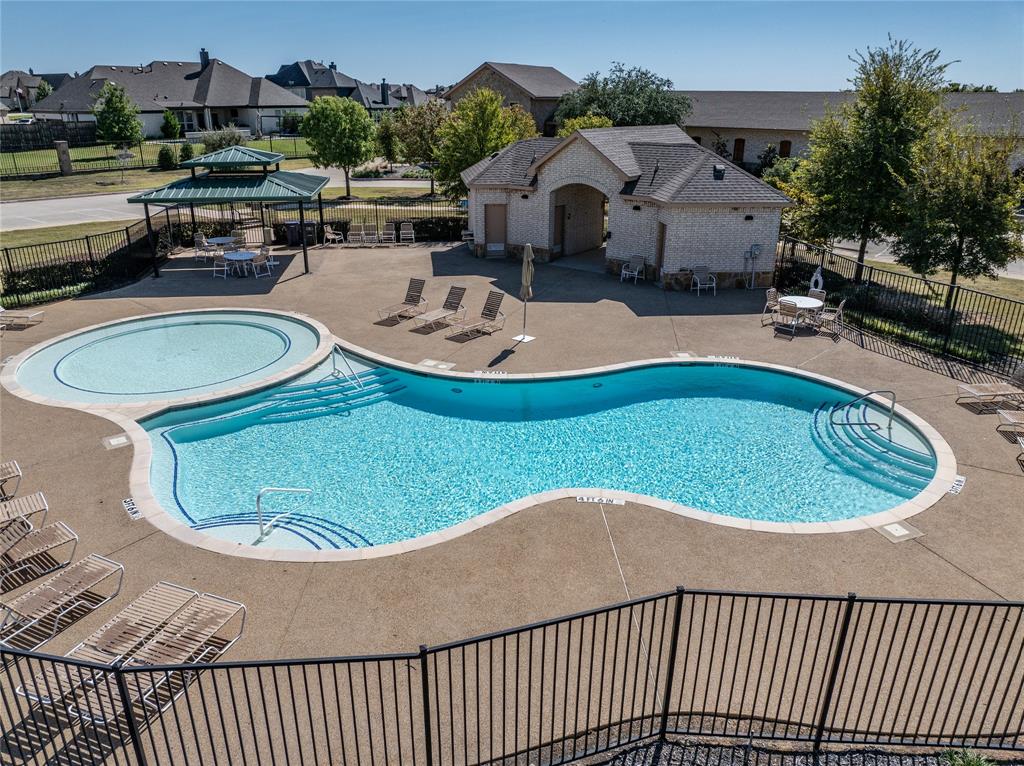216 Equestrian Road Hickory Creek, TX 75065 - Photo 24 of 26 swimming pool view with a seating space